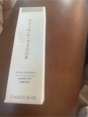 Rodan + Fields Bright Eye Complex - White and Gold Accents
